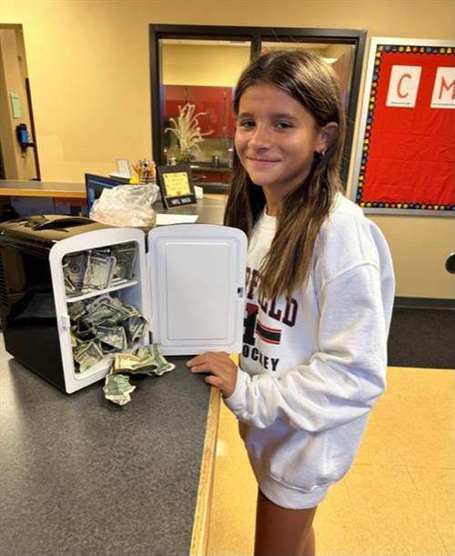 Student with cash mini refrigerator.